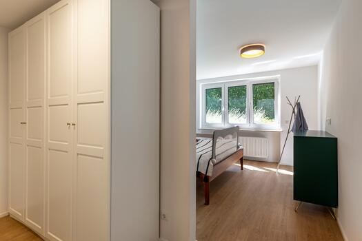 Bright bedroom with a walk-in closet