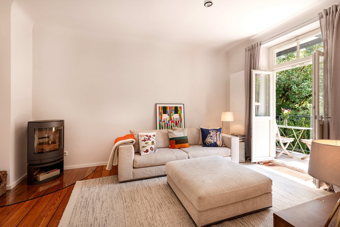 A wood-burning fireplace provides cozy warmth