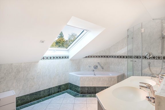 Master bathroom with shower and corner bath