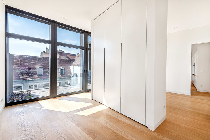 Schlafzimmer mit Zugang zur Terrasse