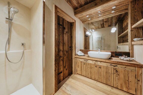 High-quality bathroom with natural wood