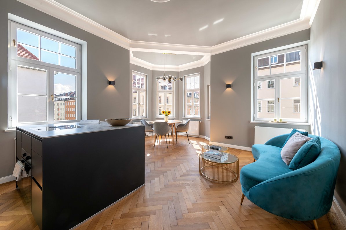 The living/dining area impresses with its sunny south-facing orientation