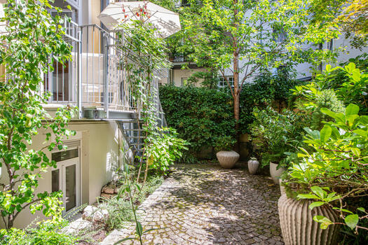 A terrace and south-facing garden extend living to the outside