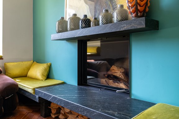 Wood fireplace in living area