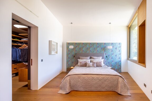 Master suite with walk-in closet and terrace