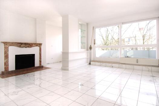 Living room with open fireplace