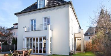 Attractive semi-detached villa in villa style with modern equipment and west garden
