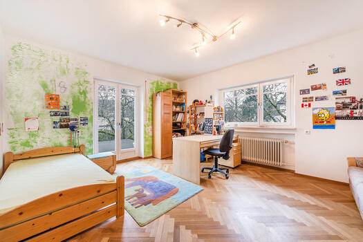Beautifully cut children's room on the upper floor