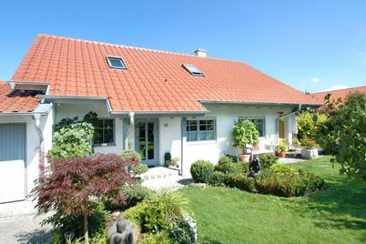 Attraktives Einfamilienhaus mit zauberhaft angelegtem Garten