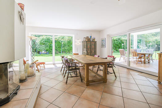 Cosy dining area with open fireplace