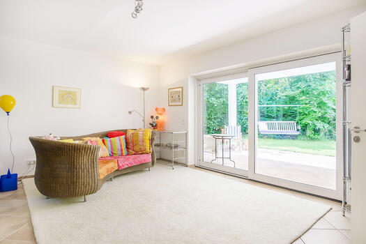 Bright living area with access to the second terrace