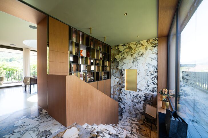 Natural stone and wood connect the living areas