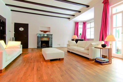 Living room with open fireplace