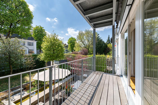 The upper floor is complemented by a charming south balcony