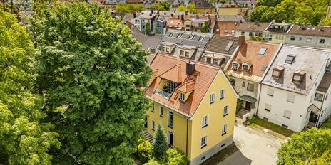 A Special Urban Gem: A Characterful Two-Family Home with Ample Potential for Renovation