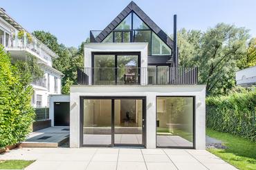 Impressive modern city villa with noble equipment, fireplace, garden and roof terraces