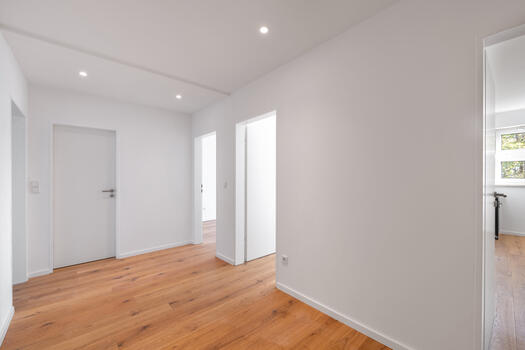 Hallway with ceiling spotlights
