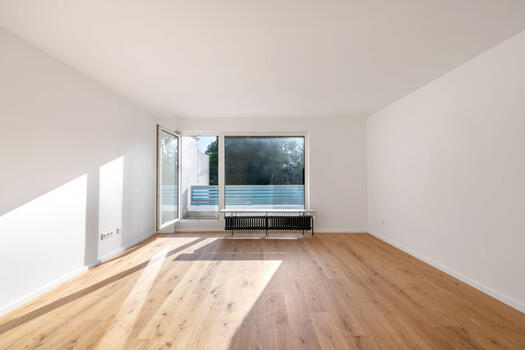 Living/dining room with balcony