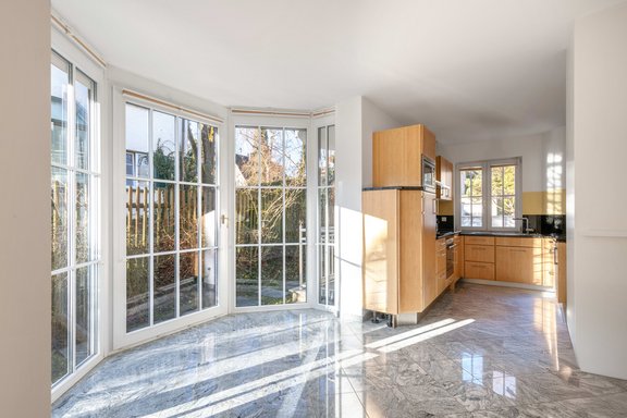 Bright bay window with kitchen