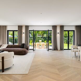 Spacious living/dining area with access to the garden