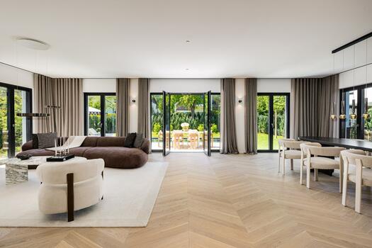 Spacious living/dining area with access to the garden