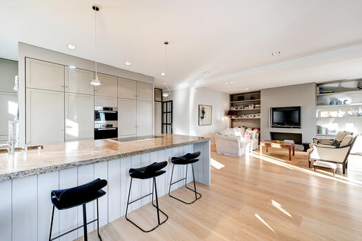 Kitchen with counter open to the living area