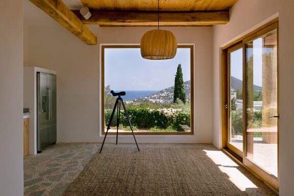 Living area with a framed view of the Mediterranean Sea