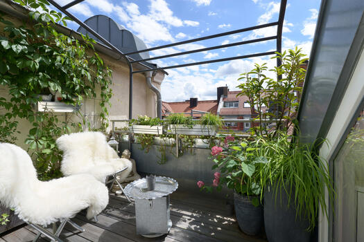 Idyllic roof terrace with awning