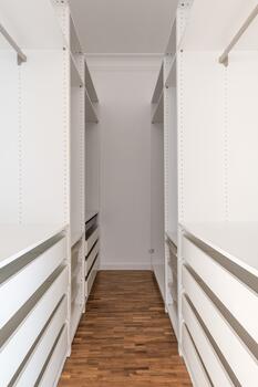 Walk-in closet with custom-built fixtures