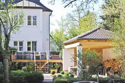 Charmante Doppelhaushälfte aus den 30er Jahren mit offenem Kamin, Terrasse und wunderschönem Garten