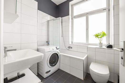 Bathroom with daylight and washing machine connection