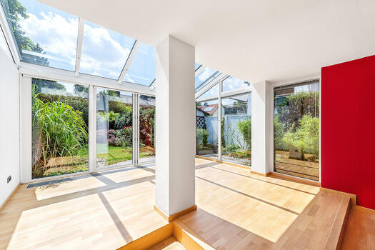 Living area with fireplace and winter garden