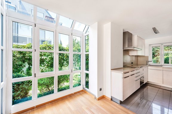Dining area with open plan kitchen