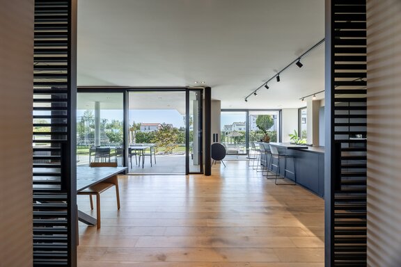 Large windows facing the outdoors create a unique sense of space