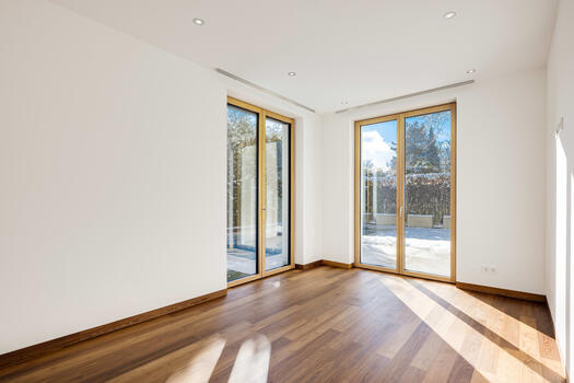 A possible guest room is complemented by a shower room