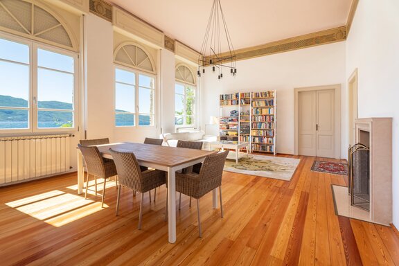 Stylish living and dining area with a fireplace