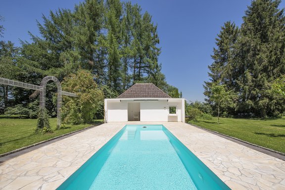 Pool with sauna house