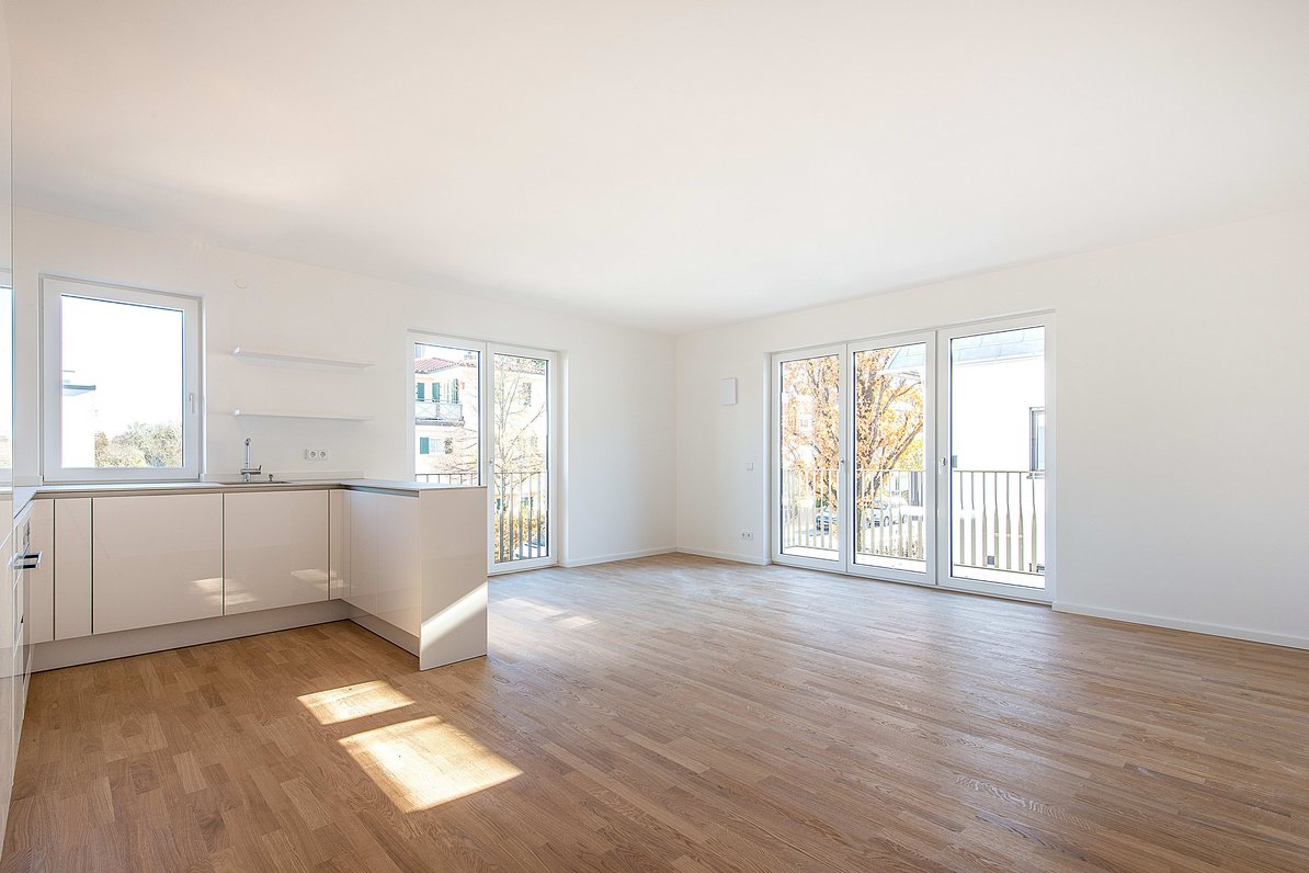 Kitchen with adjoining living-dining area