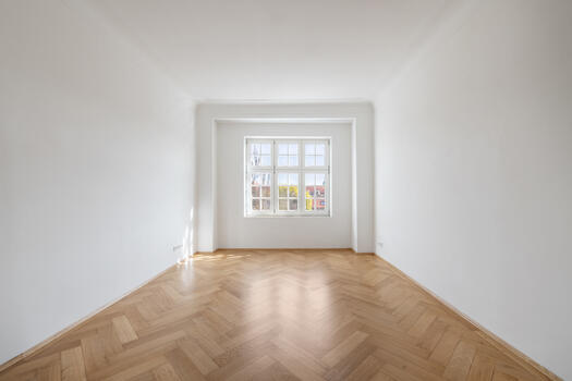 Bedroom with original herringbone parquet flooring