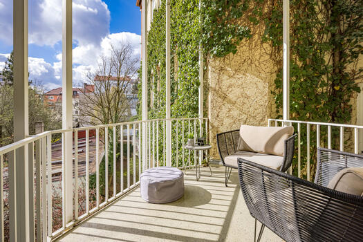 The south balcony faces a spacious courtyard square