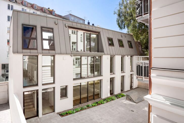 The rear building in its current condition (with virtual greenery in the courtyard)