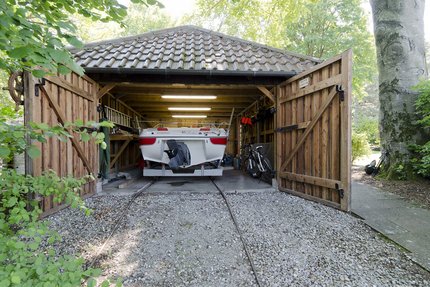 Boat garage with slipway