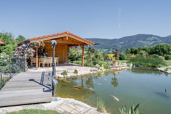 Swimming pond with a bridge
