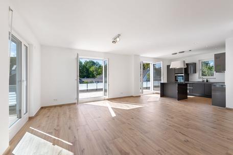 First-time occupancy: 3-room apartment with penthouse flair and sunny roof terrace