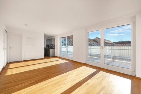 Erstbezug: Dachgeschoss-Wohnung mit lichterfülltem Ambiente und Dachterrasse