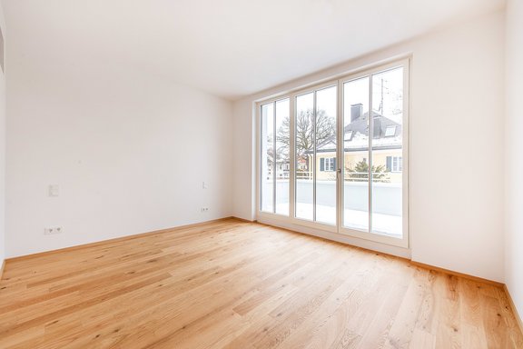 Bright bedroom with terrace access