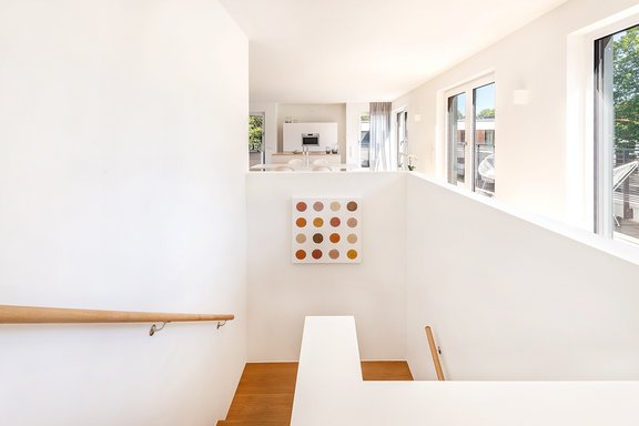 Open staircase leads to the sleeping level