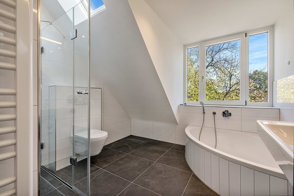 Bathroom with corner bath