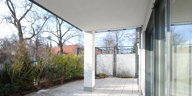 Exklusive Drei-Zimmer-Gartenwohnung mit offenem Kamin