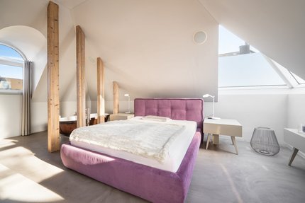 Luxurious master bedroom with unique architecture